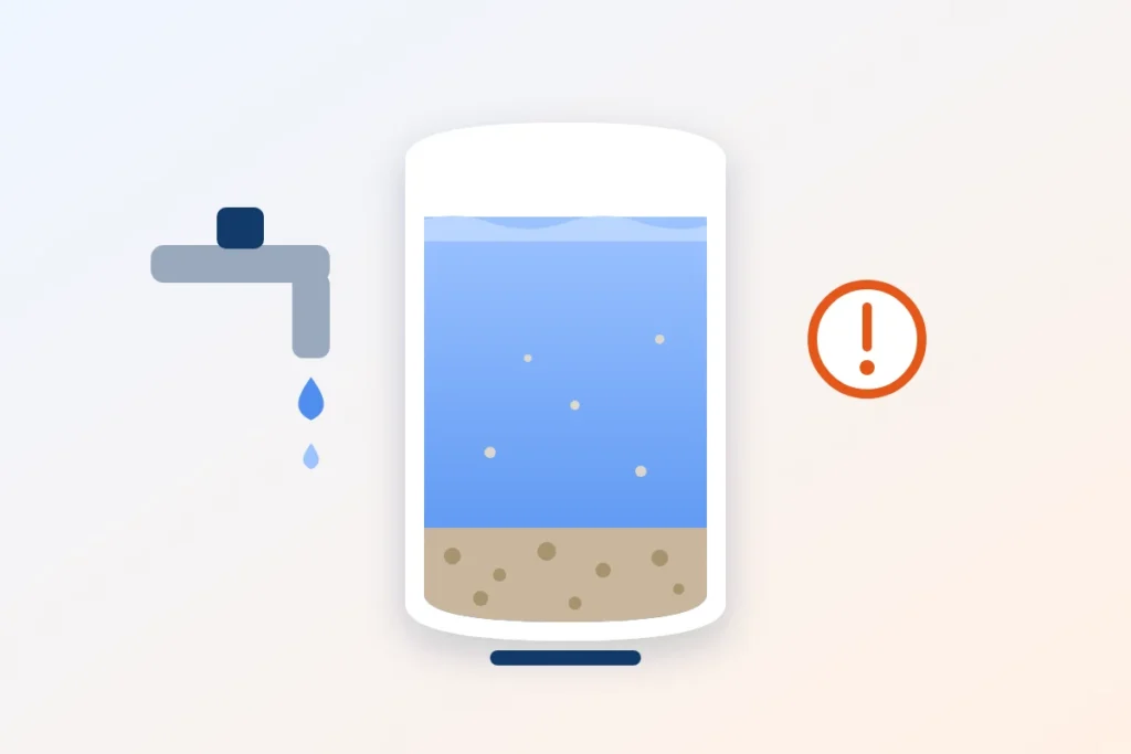 Sediment build-up inside a water heater from hard water